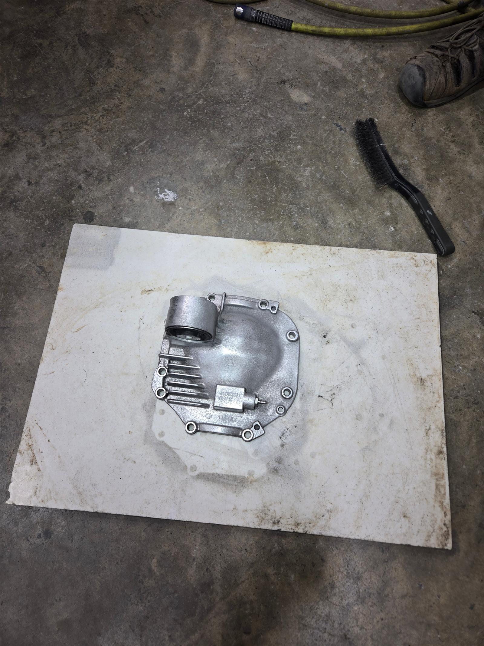 Driveshaft cover cleaning - before and after